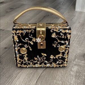 Elegant Black and Gold Embellished Handbag
